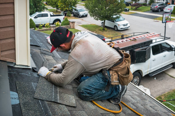 Professional Roofing technician working in Plymouth, MA